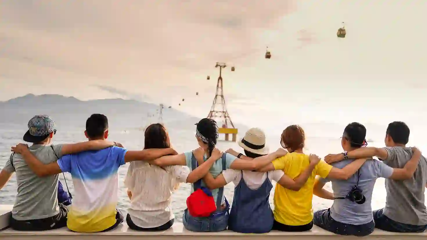 ravelers bonding while watching scenic cable car ride